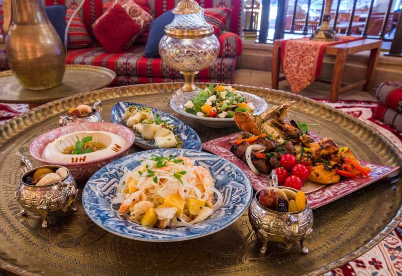 Break your fast under the stars at one of the best restaurants in Dubai, Al Hadheerah, located amid the Arabian desert.