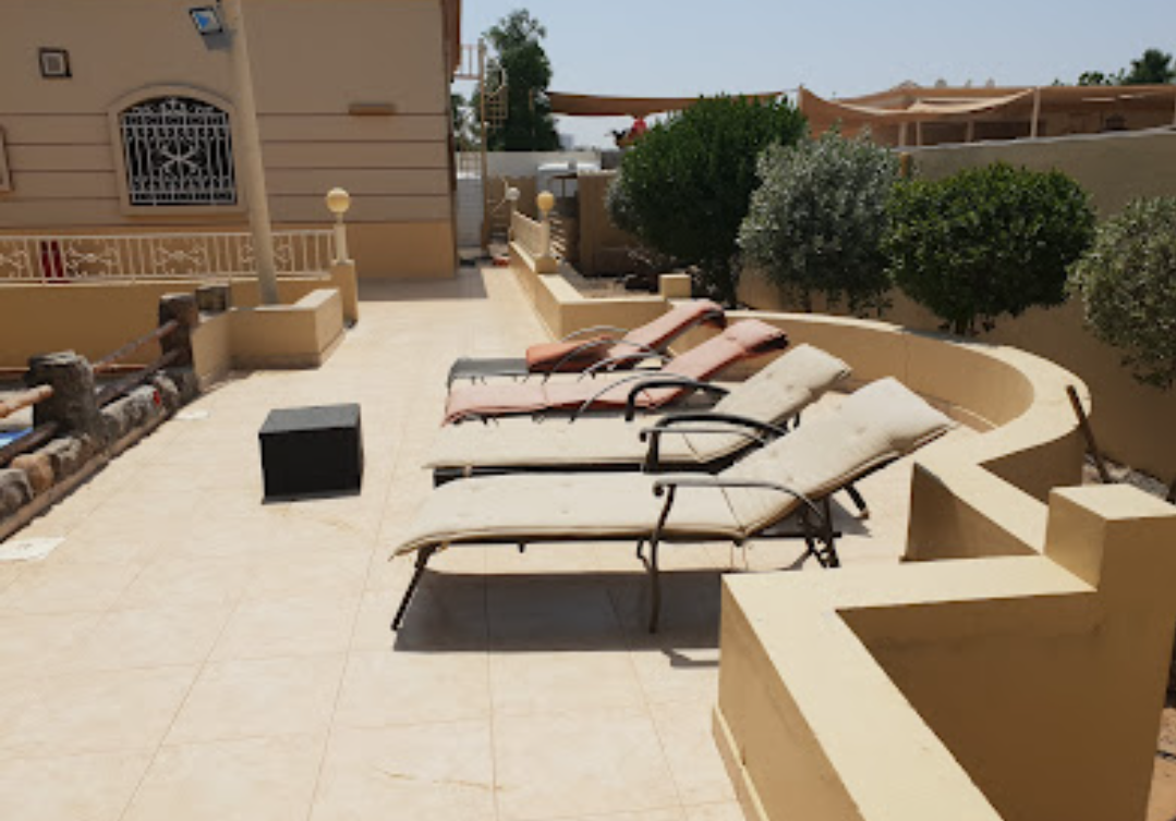 villa with a swimming pool for rent in Ajman
